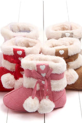 Chaussons à pompon pour bébé