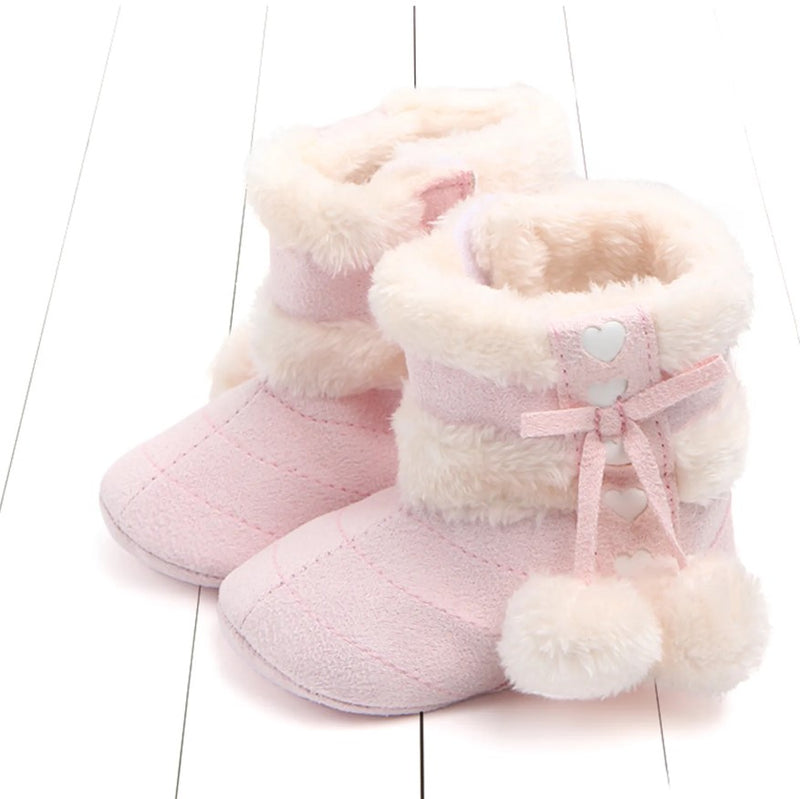 Chaussons à pompon pour bébé